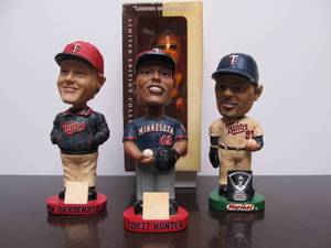lot 126 image: Lot of 4 Assorted Sports Bobbleheads Including MN Twins