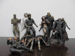 lot 128 image: Lot of Assorted SIDESHOW INC Monster Action Figures