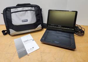 lot 332 image: Working Portable CDDVD Player wAccessories & Case