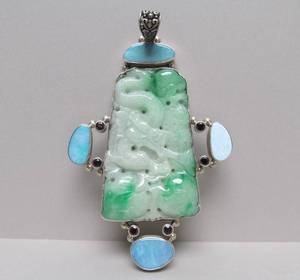 lot 4 image: Beautiful Large Sterling Silver & Carved Jade Pendant
