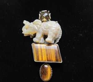 lot 17 image: Larger Sterling Silver & Hand Carved Stone elephant Pendant wTiger Eye