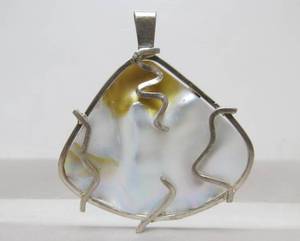 lot 44 image: Excellent Sculpted ShellPearl & Sterling Silver Modernist Pendant