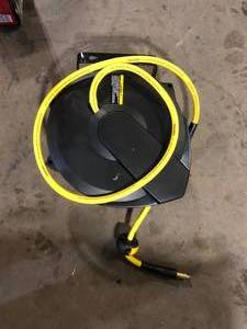 lot 17 image: Husky 38 in. x 50 ft. Enclosed Hybrid Air Hose Reel Customer Returns See Pictures