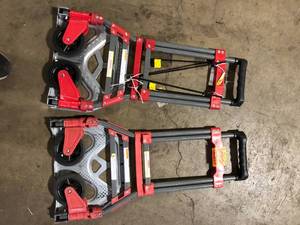 lot 27 image: Lot of Milwaukee 150 lbs. Convertible Fold-Up Steel Hand Truck with One 60 in. Bungee Cord Customer Returns See Pictures
