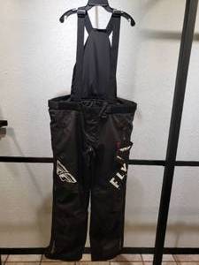 lot 11 image: Fly Racing SNX Pro Bibs  Pants with removal should straps - Black - Mens 3XL
