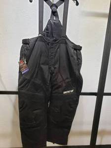 lot 47 image: Artic Cat Premium Pro Snow Bibs  Pants with removal should straps - Black - Mens 2XL