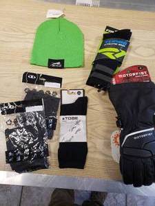 lot 215 image: Motorfist Carbide Snowmobile gloves Medium, Arctic Cat hat, FXR socks, Tobe Primus Merino socks and 2 Artic Cat Balaclavas black