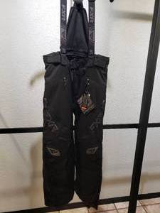 lot 54 image: FXR Edge Snow Bibs  Pants with removable shoulder straps - Black - Womens size 10