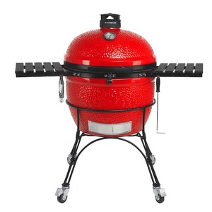 lot 151 image: Kamado Joe Big Joe II 24 in. Charcoal Grill in Red with Cart, Side Shelves, Grate Gripper, and Ash Tool