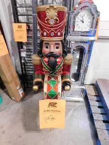 lot 142 image: Fraser Hill Farm 60-in Lighted Musical Life-Sized Nutcracker Christmas Decor