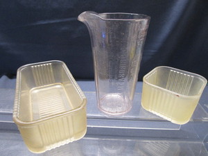 lot 7 image: Vintage Family Measuring Cup, Refrigerator Dishes