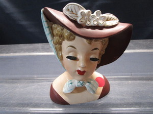 lot 31 image: Head Vase