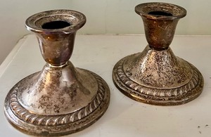 lot 17 image: Pair of Vintage Sterling Silver Weighted Candle Stick Holders