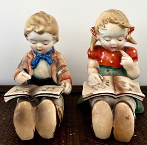 lot 74 image: Vintage Hummel Style Bookworm Reading Girl and Boy Bookends