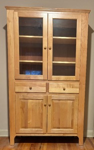 lot 12 image: Amerock Medium Brown Wood Decorative Cabinet with Glass Doors