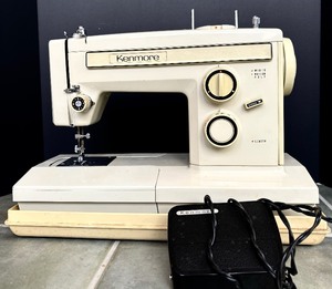 lot 234 image: Vintage Sears Kenmore Sewing Machine Width Button Hole and Length and Case