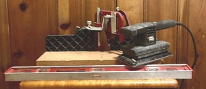 lot 253 image: Tool Lot including Unitek by Empire Level, Black and Decker 12 Sheet Finishing Sander and More