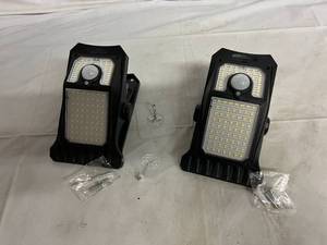 lot 56 image: 2 Solar Powered Fence Post Cap Lights