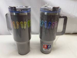 lot 3 image: MM. 2x CircleK Stainless Steel Vacuum Insulated Tumblers