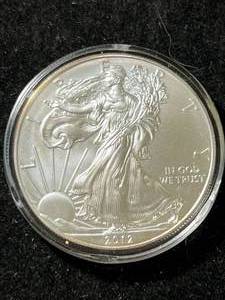 lot 05 image: 2012 AMERICAN SILVER EAGLE 1 TROY OZ .999 FINE SILVER IN AIRTITE