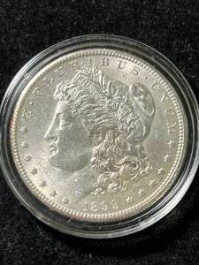 lot 12 image: 1899-O US MORGAN SILVER DOLLAR IN AIRTITE
