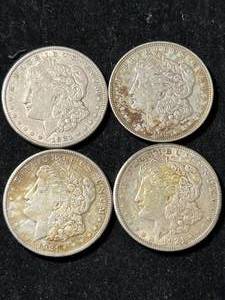 lot 16 image: GROUP OF 4 US 1921 MORGAN SILVER DOLLARS
