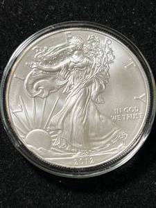 lot 19 image: 2012 AMERICAN SILVER EAGLE 1 TROY OZ .999 FINE SILVER IN AIRTITE