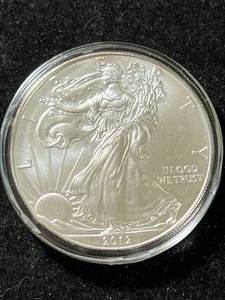 lot 37 image: 2012 AMERICAN SILVER EAGLE 1 TROY OZ .999 FINE SILVER IN AIRTITE