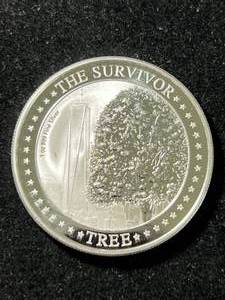 lot 38 image: 2022 SURVIVOR TREE ROUND 1 TROY OZ .999 FINE SILVER