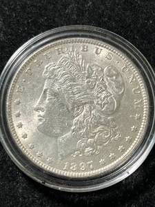 lot 49 image: 1897 US MORGAN SILVER DOLLAR IN AIRTITE