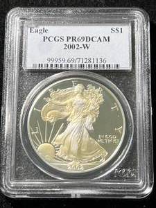 lot 67 image: 2002 PROOF AMERICAN SILVER EAGLE PCGS PR69DCAM
