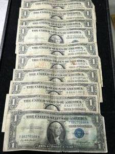 lot 84 image: GROUP OF 10 US $1 BLUE SEAL SILVER CERTIFICATES