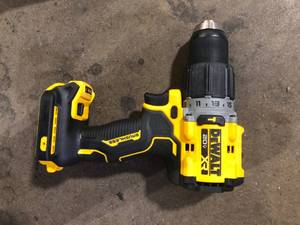 lot 38 image: DEWALT 20V Compact Cordless 12 in. Hammer Drill (Tool Only)  Customer Returns See Pictures