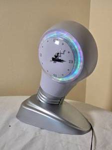 lot 139 image: Zany Vintage Dancing Electric Light Desk Clock