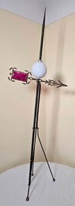 lot 31 image: Stunning Antique Twisted Iron Lightning Rod with Milk Glass Accent