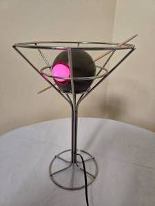lot 30 image: Fun Vintage Martini Glass Accent Lamp with Red Olive Pit Bulb