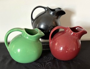 lot 107A image: Three Vintage Ball Pitchers by Hall and USA Pottery