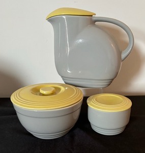 lot 103 image: 1940s American Art Deco Hall Ovenware China for General Electric Refrigerator Pitcher with Lid and Covered Dishes