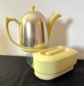 lot 117 image: Vintage Hall China Company Westinghouse Yellow Refrigerator Dish Container and Canary Yellow Teapot with Metal Cozy