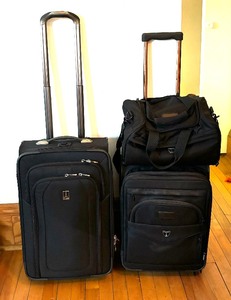 lot 246 image: Travel Pro Luggage  Suitcases  Roller Bags