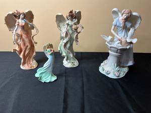 lot 22A image: Collection of 4 Decorative Angel Figurines