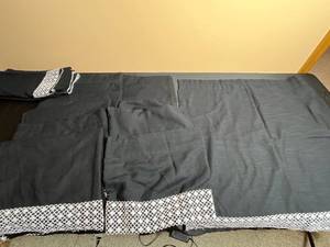 lot 41 image: Set of 2 Valances and 11 Curtain Panels - Black with White Trim