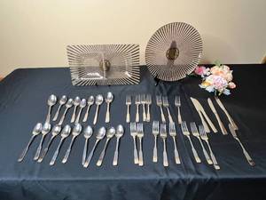 lot 47 image: Vintage Stainless Steel Flatware Set with Decorative Glass Plates