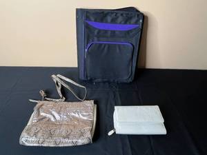 lot 68 image: Assorted Bags The Sak Crossbody Bag, Croft & Barrow Wallet, and Black Organizer