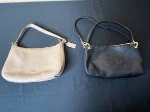 lot 96 image: Set of 2 Coach Handbags - Black and Beige Leather