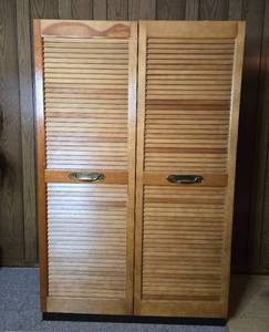 lot 214 image: Tall Spring-Style Wooden Wardrobe with Louvered Doors