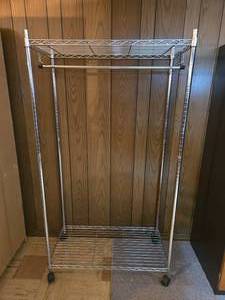 lot 216 image: Rolling Wire Garment Rack with Bottom Shelf