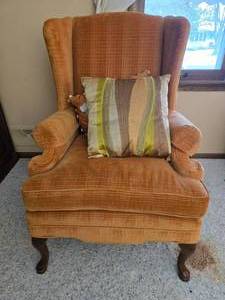 lot 58 image: Vintage Wingback Armchair with Cushion in Orange Fabric