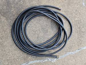 lot 180 image: Heavy-Duty Black Rubber Hose
