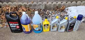 lot 319 image: Lot of 7 Automotive Fluids Including Anti-Freeze, Washer Fluid, and Oil - container quantities unverified
